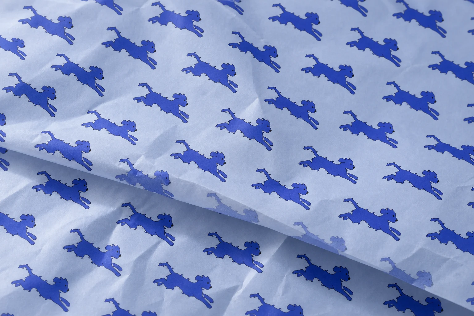 Papier de soie illustré de petits chiens bleus
